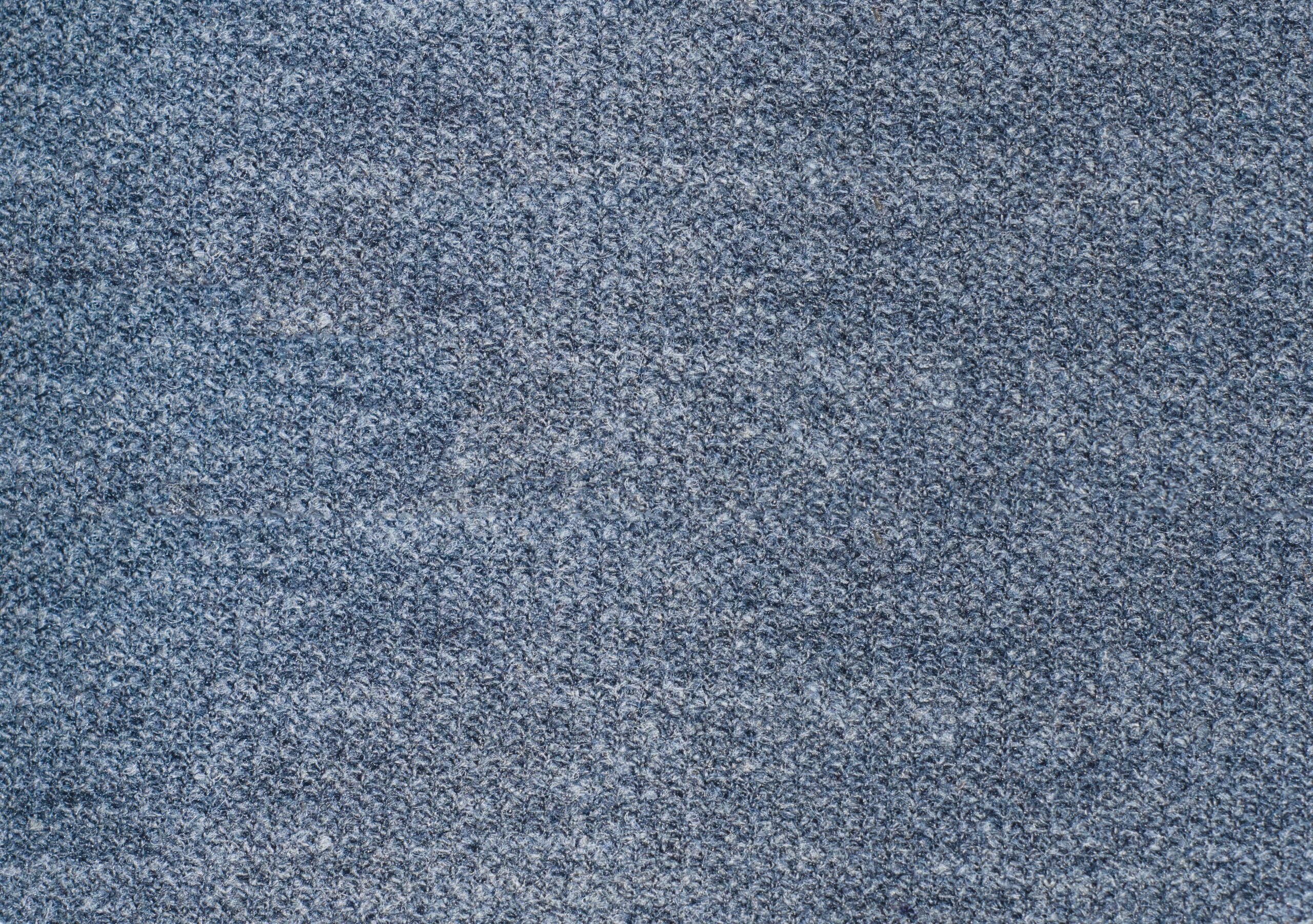 Zoom surface textile bleu texturee details