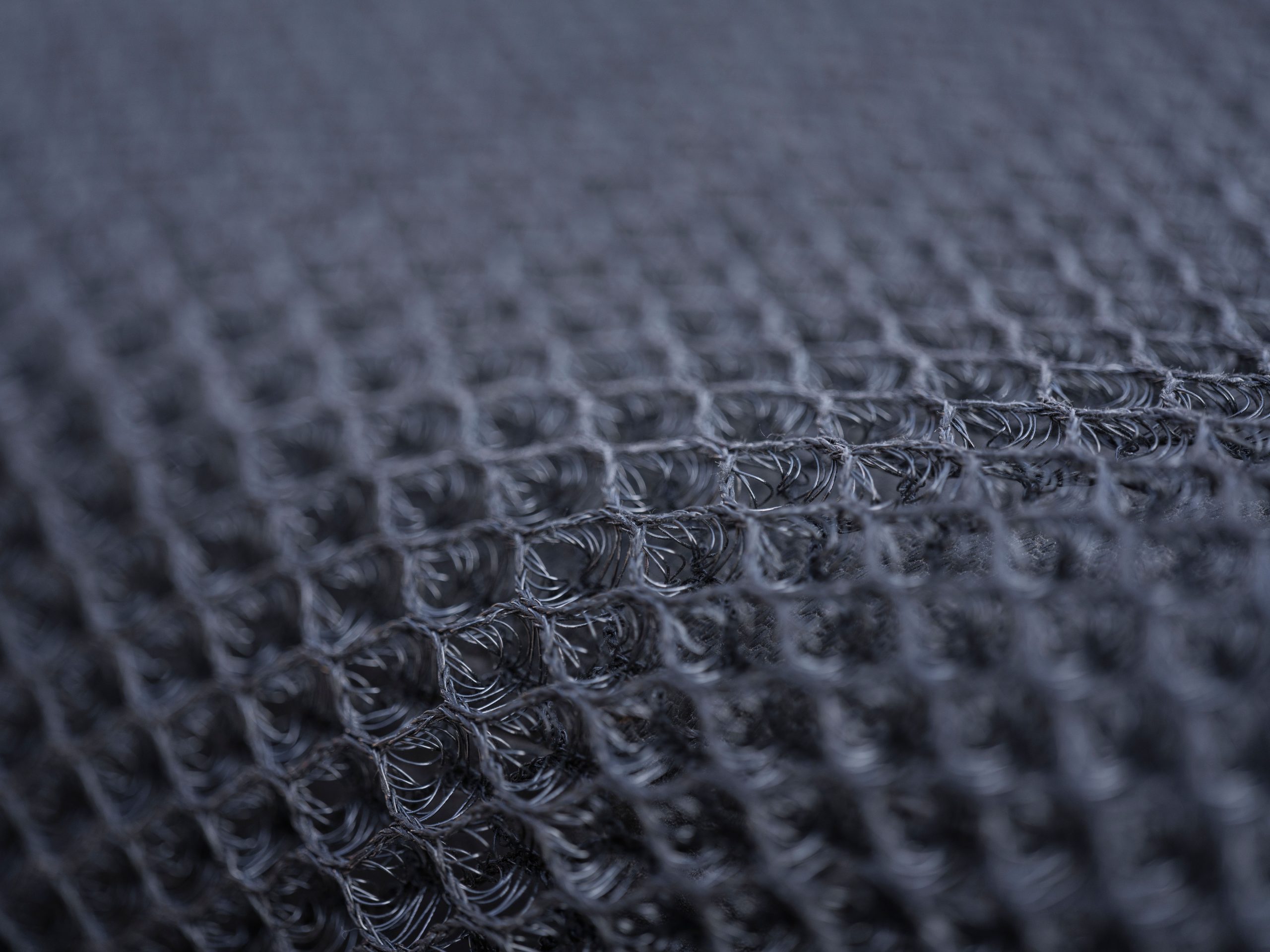Macro tissu synthetique motifs geometriques