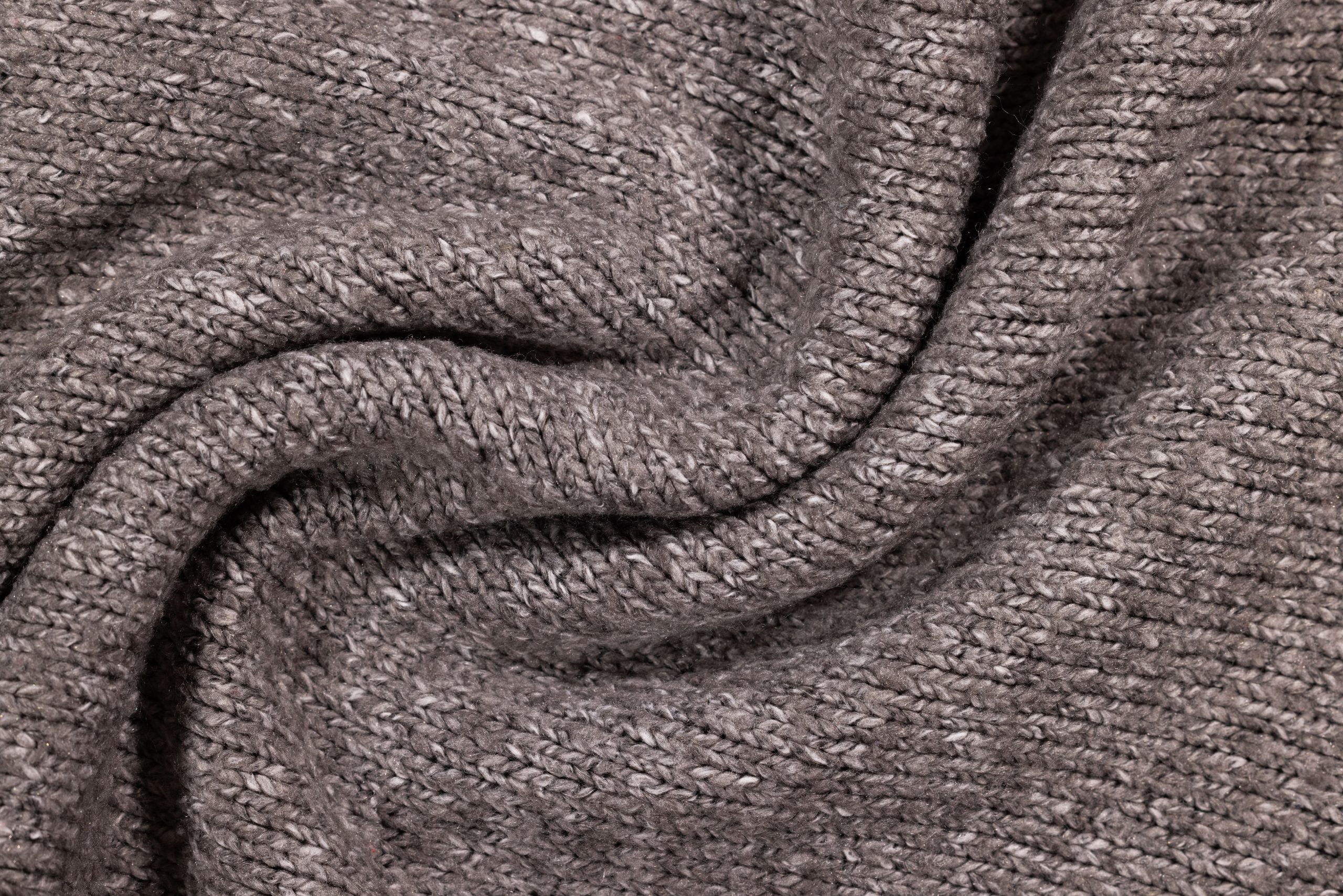Détail motif tissage tricot gris