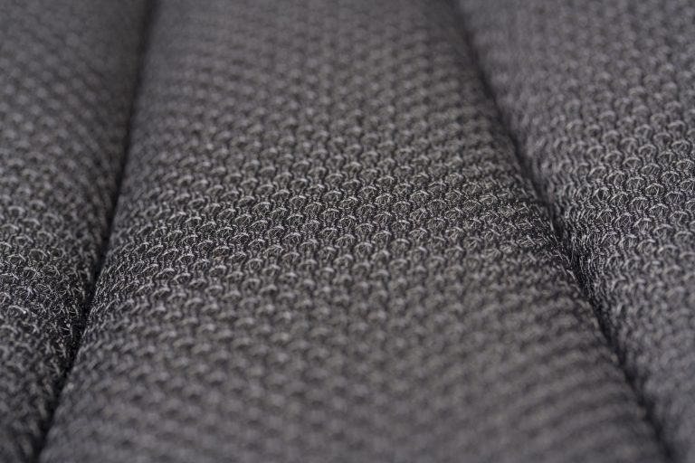 Gros plan texture tissu gris motif tissage