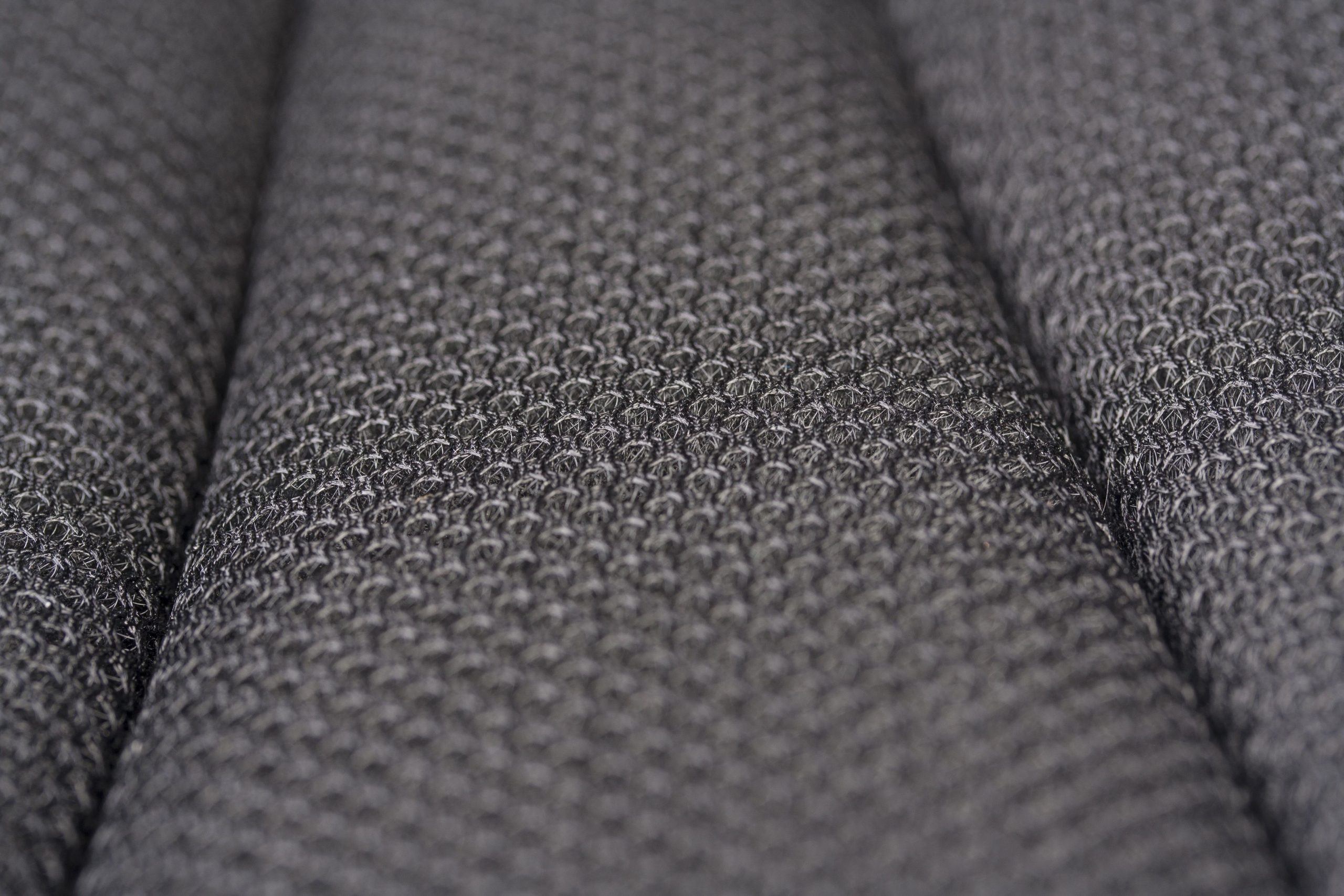 Gros plan texture tissu gris motif tissage