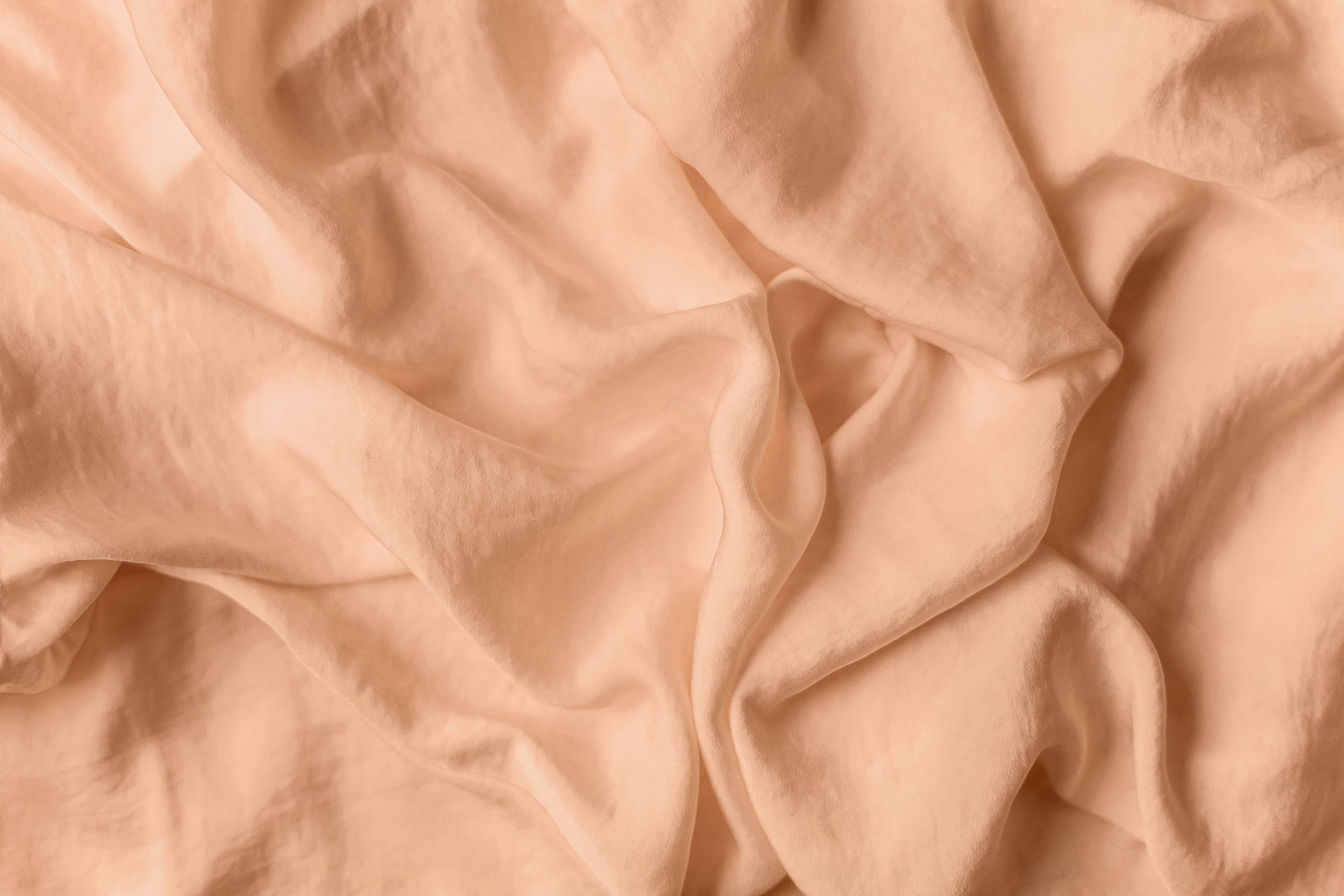 Viscose pêche détail texture naturelle froissée